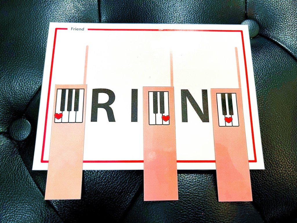 The word "Friend" is spelled out using keyboard cards and letters.