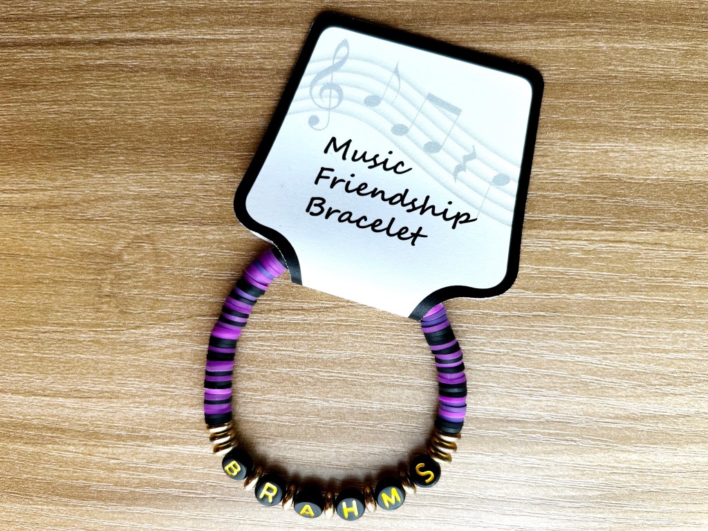Music friendship bracelet on a display card.