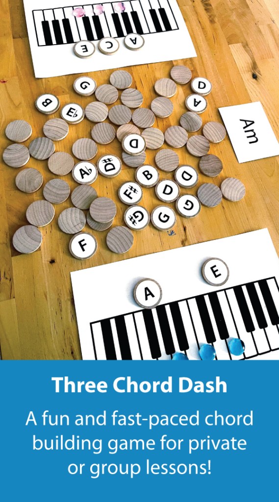 A chord game is laid out on table. It includes two printed keyboards, a chord flashcard, and wooden circles with pitch names on them.